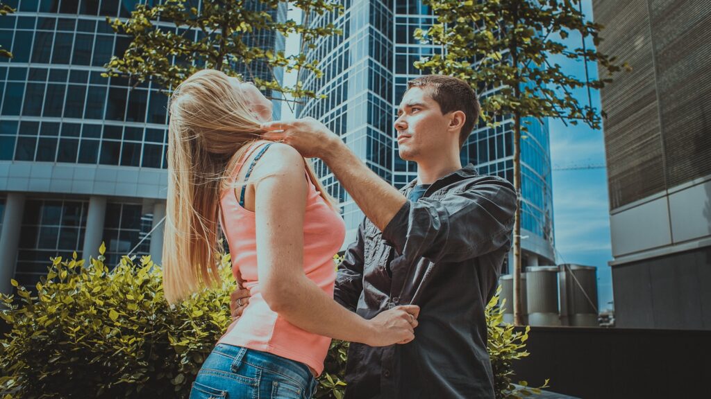 a man and woman embracing