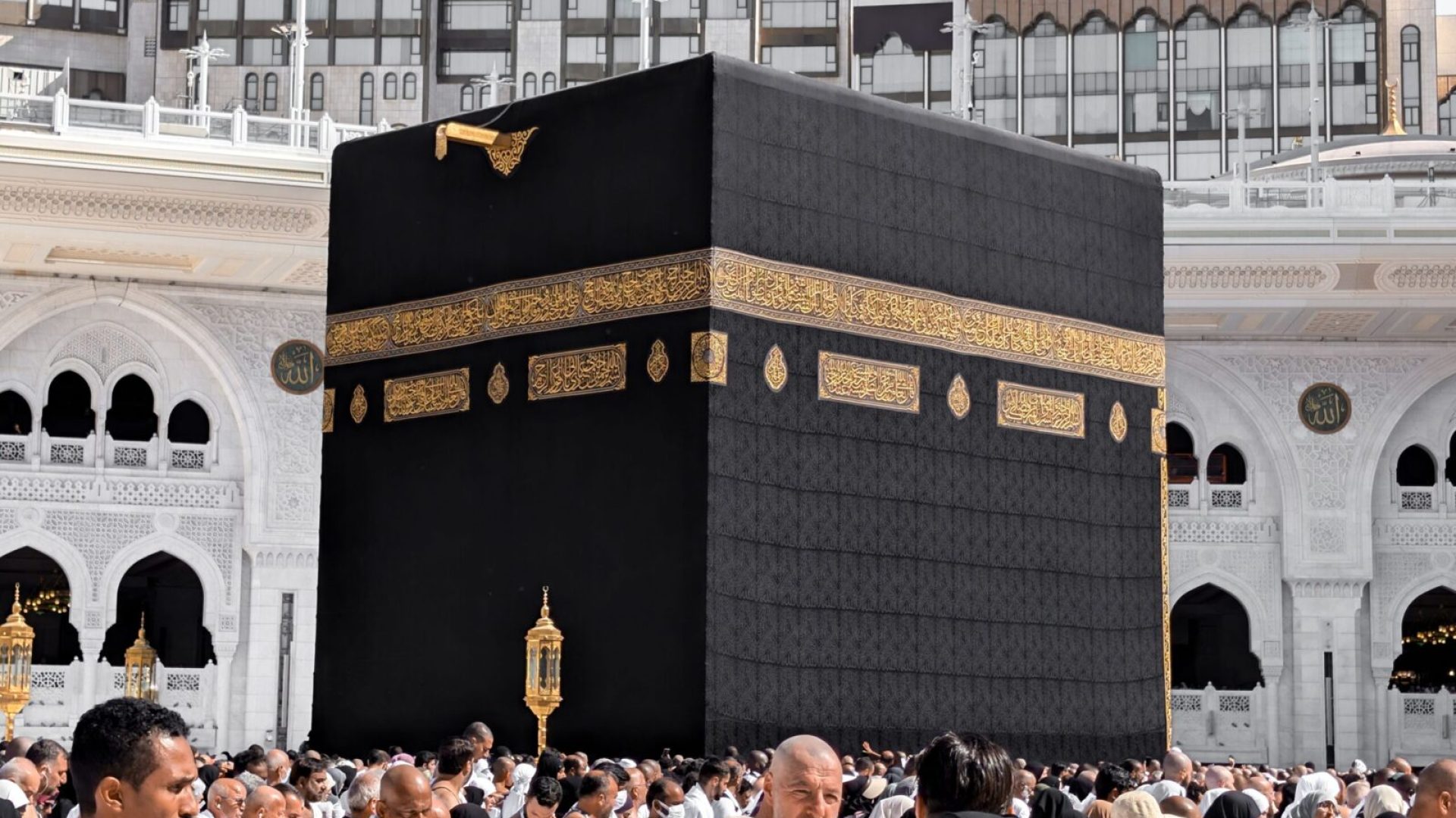 A large group of pilgrims gathers at the holy Kaaba during the Hajj pilgrimage in Mecca, Saudi Arabia.