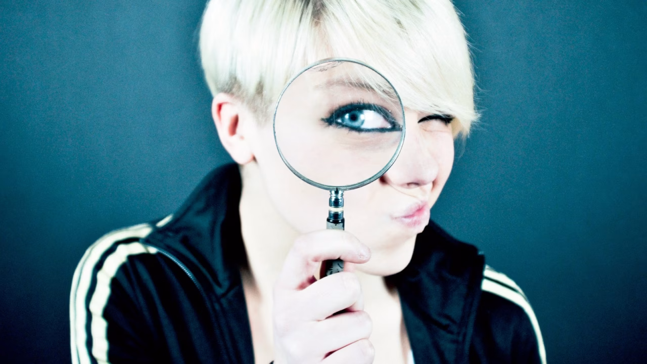 woman wearing black collared jacket